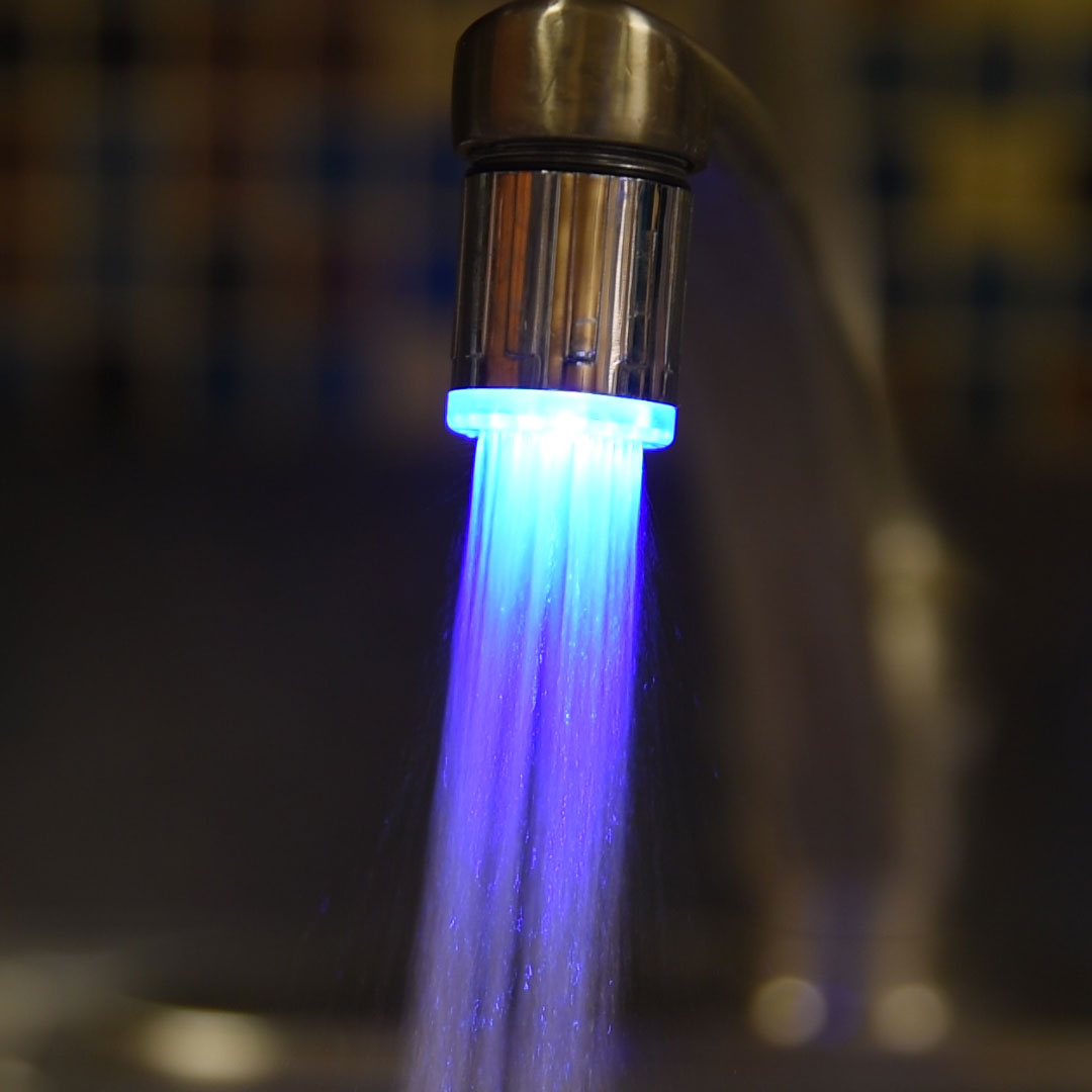 Temperature indicating faucet with LED lights